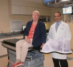 The high-level precision afforded by the Protura Robotic Patient Positioning System made all the difference in cancer treatment for patient Kathy Kelly, shown with her doctor, Joseph Bargellini.